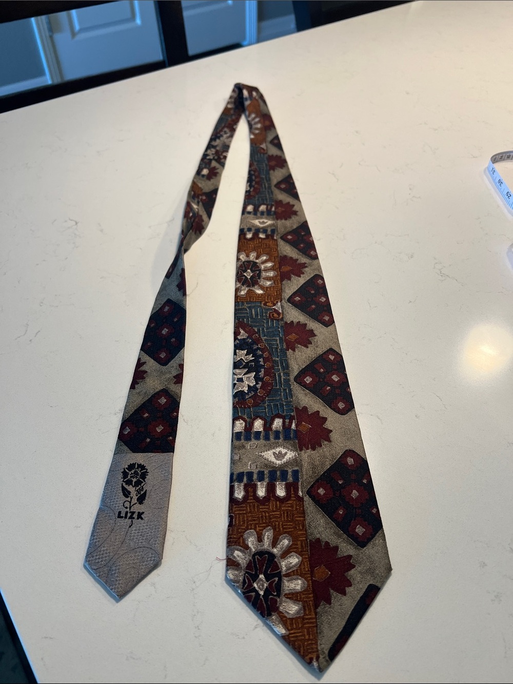 Liz K Patterned Silk Tie in Brown and Blue